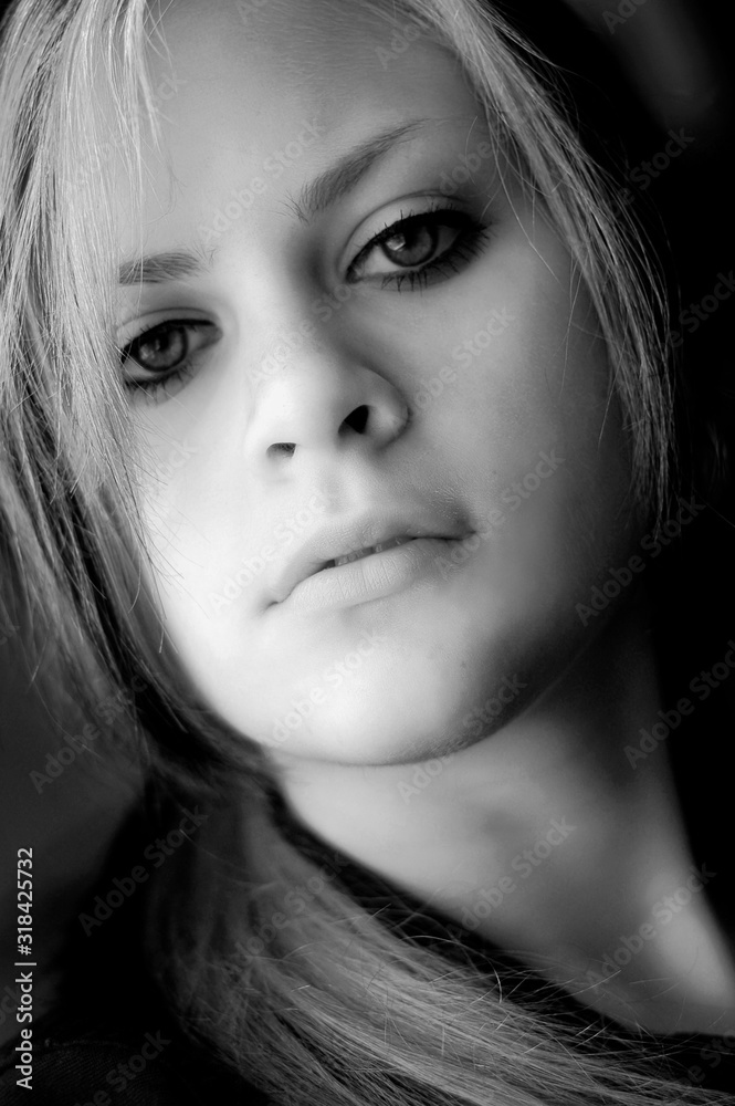 Young woman in black and white Young woman in black and white