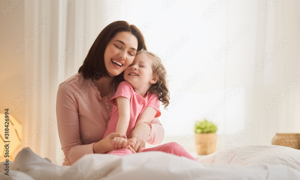 girl and her mother enjoy sunny morning girl and her mother enjoy sunny morning