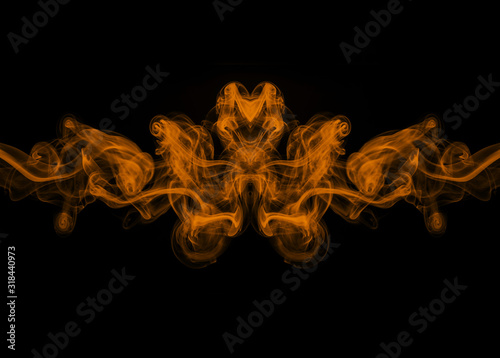 art of yellow smoke abstract on black background for design