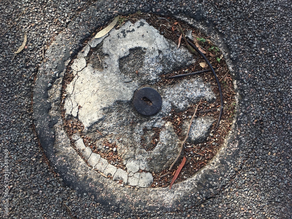 Old road manhole