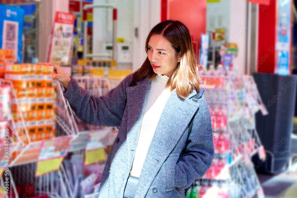 Asian Women shopping at the supermarket. Asian Women shopping at the supermarket.
