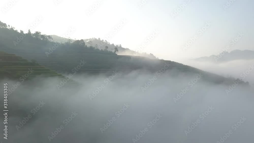 The morning mist on the mountain is like a beautiful ladder taken with a high-angle drone. The morning mist on the mountain is like a beautiful ladder taken with a high-angle drone.