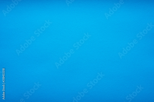 Grain light blue paint wall or red paper background or texture