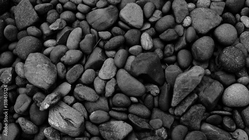 background of stones. black pebble stone