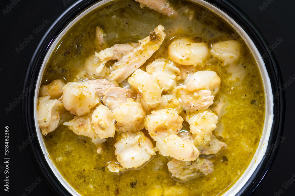 Green Pozole, traditional Mexican cuisine, hominy stew Green Pozole, traditional Mexican cuisine, hominy stew