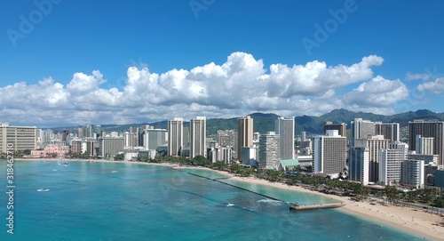 Waikiki Beach photo take from Diamond head showing all the hotels in Waikiki  Honolulu  Oahu  Hawaii and magnificent Waikiki beach in the main picture with so many tourists  and turquoise waters