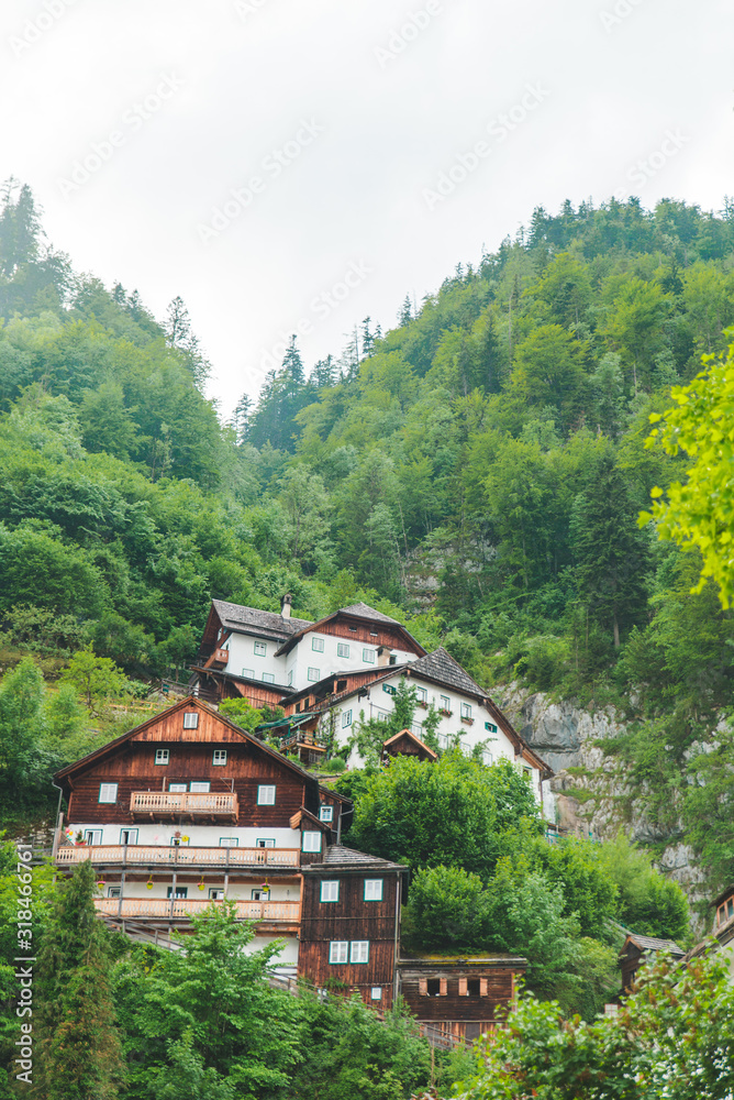 building at the cliff edge summer time hallstatt austria