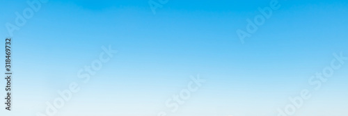 Clear cloudless bright blue sky in sunny day photo