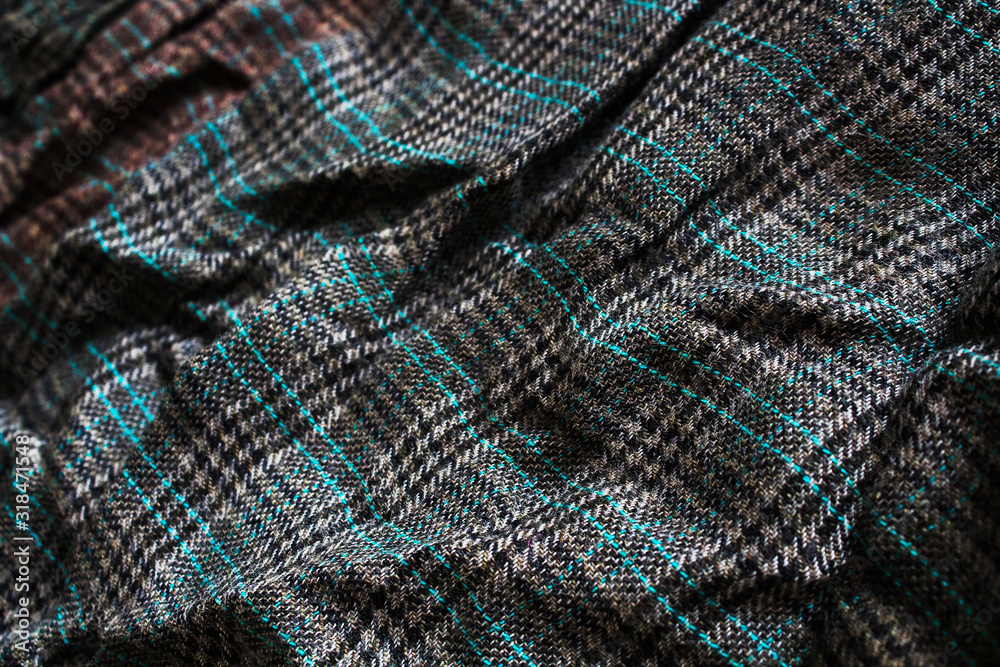 Checkered fabric. Fabric texture. Selective focus. Checkered fabric. Fabric texture. Selective focus.