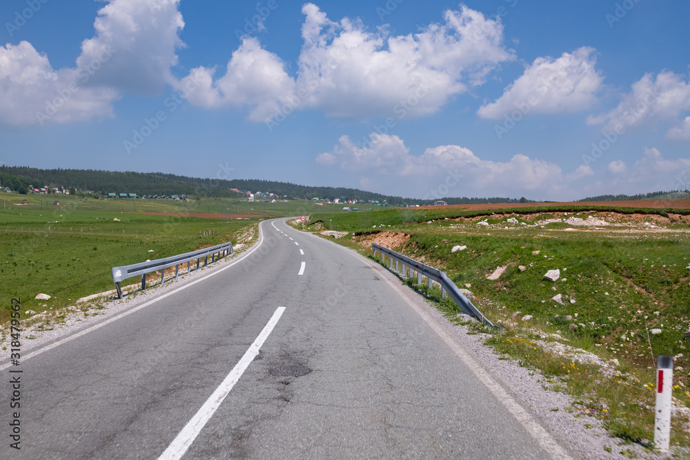 Landscape with a village and a road in the north Montenegro Landscape with a village and a road in the north Montenegro