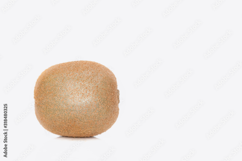Kiwi, green natural delicious and appetizing fruit or gooseberry grown in China on a white isolated background. Healthy foods in stores. Kiwi, green natural delicious and appetizing fruit or gooseberry grown in China on a white isolated background. Healthy foods in stores.