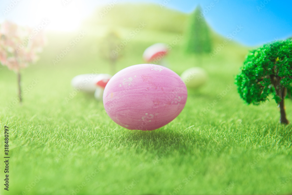 Easter egg hunt with pink colored egg in Dreamland or fairy world. Easter egg hunt with pink colored egg in Dreamland or fairy world.