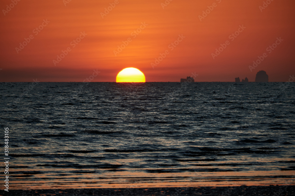 A sunset view with Omega sun at Hat Yao, Krabi, Thailand