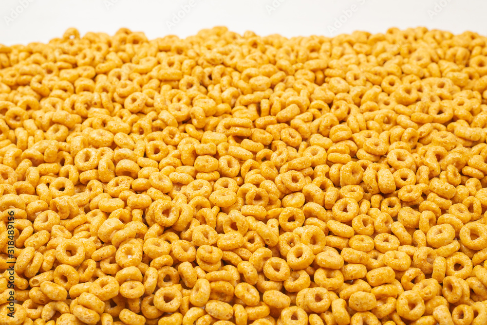 Corn-flakes background and texture. Top view. Corn-flakes background and texture. Top view.