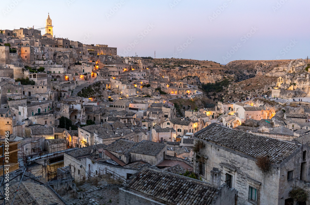 View of the Sassi di Matera a historic district in the city of Matera, well-known for their ancient cave dwellings. Basilicata. Italy