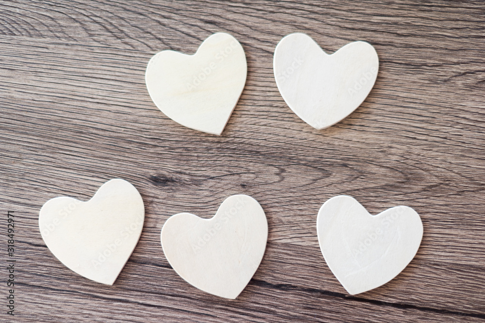 Wooden hearts on a wooden background Wooden hearts on a wooden background