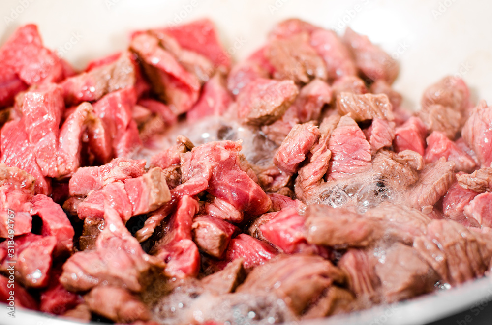 Pieces of fresh beef meat fried in a pan Pieces of fresh beef meat fried in a pan