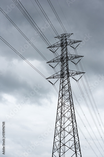 High voltage pole. Electrical power lines.