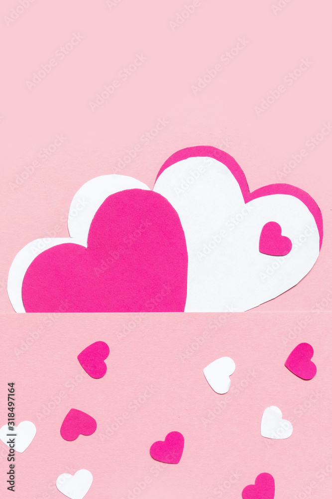 Layout card for the holiday Valentine's Day. Hearts from paper scrapbooking, origami, handmade on a pink background Layout card for the holiday Valentine's Day. Hearts from paper scrapbooking, origami, handmade on a pink background