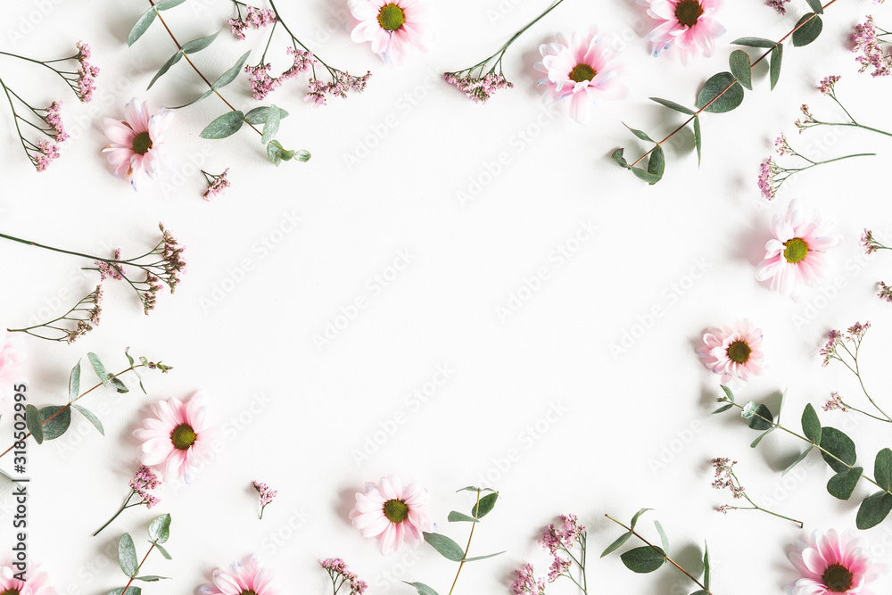 Fototapeta Flowers composition. Pink flowers on white background. Flat lay, top view