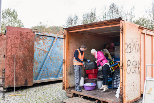 Man and woman in recycling center