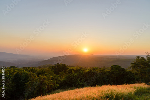Fototapeta Naklejka Na Ścianę i Meble -  landscape of mountains valley during the sunset. Natural outdoor background concept
