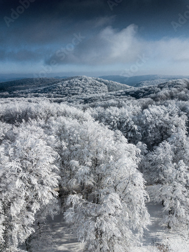 Aerial view of frozen white...