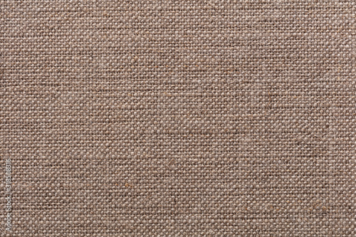 Expensive linen canvas background in adorable brown color.