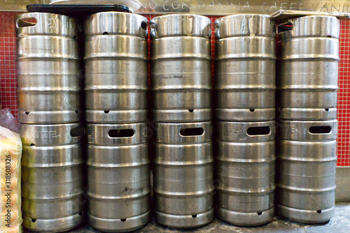 stack of metal beer barrel