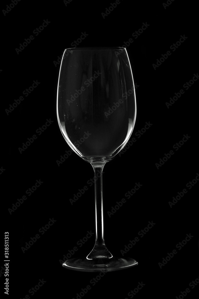 Empty tall wine glasses on black background, isolated Empty tall wine glasses on black background, isolated