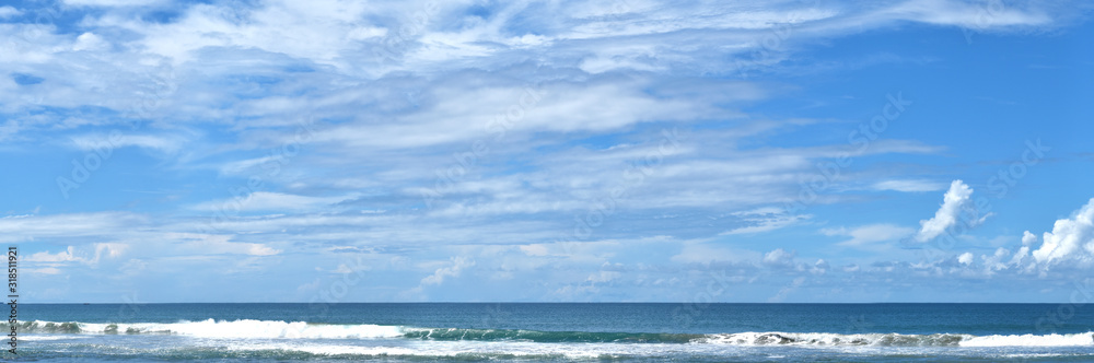 Panoramic beautiful tropical beach with blue sky.