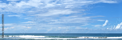 Panoramic beautiful tropical beach with blue sky.
