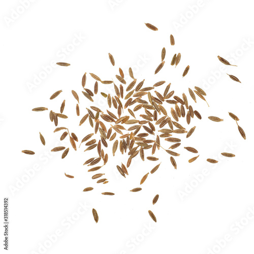 close up of cumin seeds isolated on white background