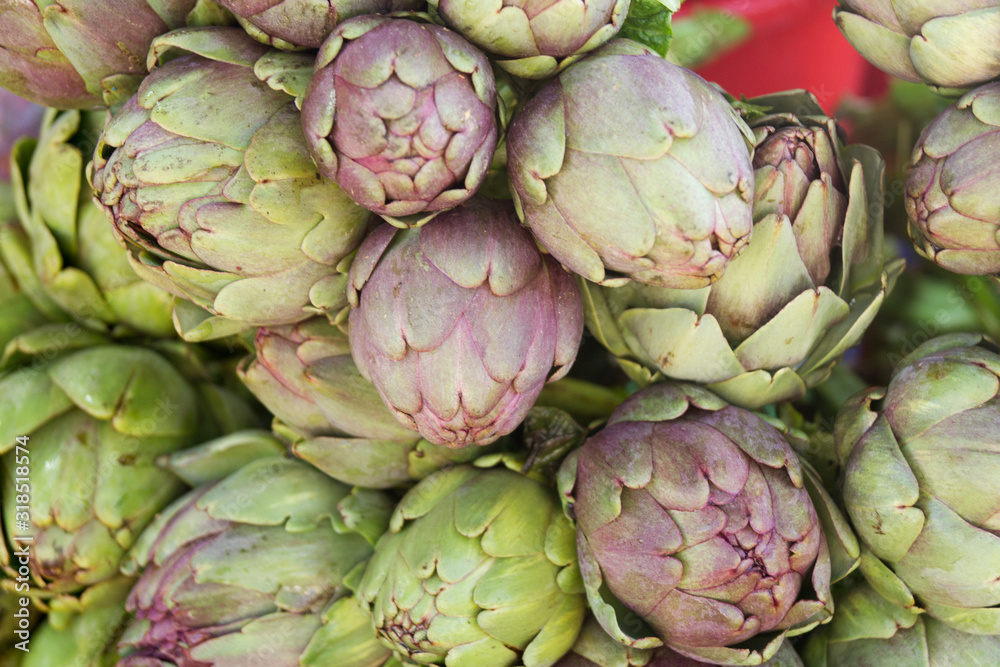 Fototapeta premium ripe artichoke on counter close-up