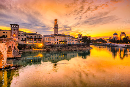 Verona, Italy. Scenery with Adige River and Ponte di Pietra, old roman bridge.  Veneto