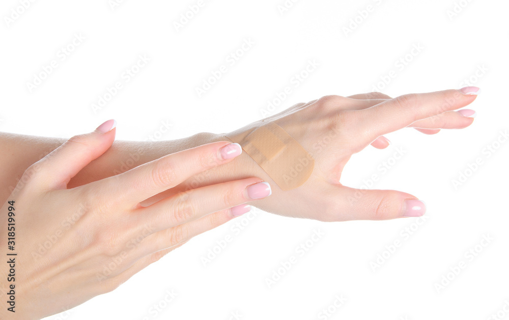Woman hand with medical patch plaster on white background isolation Woman hand with medical patch plaster on white background isolation