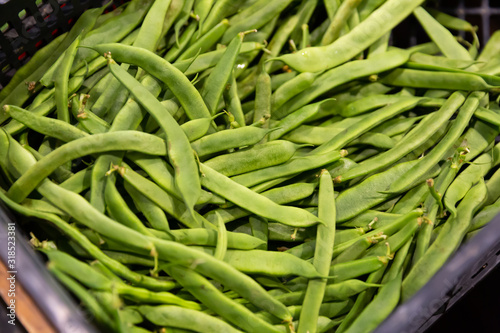 Ripe beans on a market counter