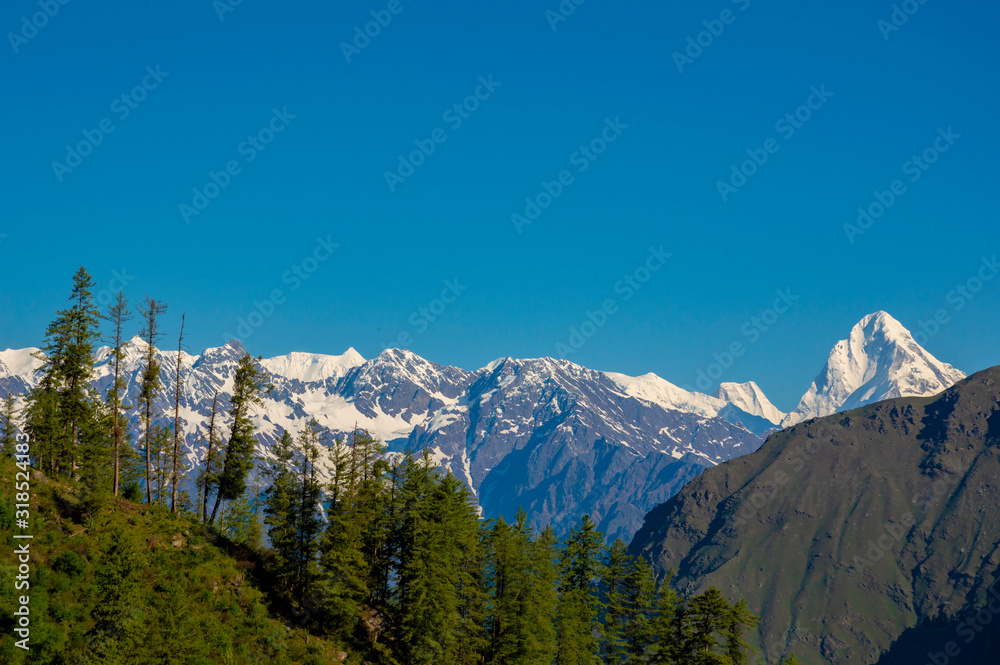Mt Neelkanth and Mt Balakun appear on the way to the future Badri temple