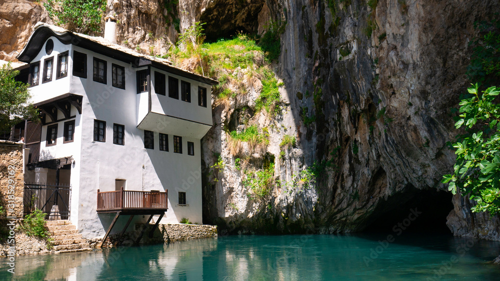 Blagaj Tekija house in cave near river. Blagaj is popular destination in Bosnia.
