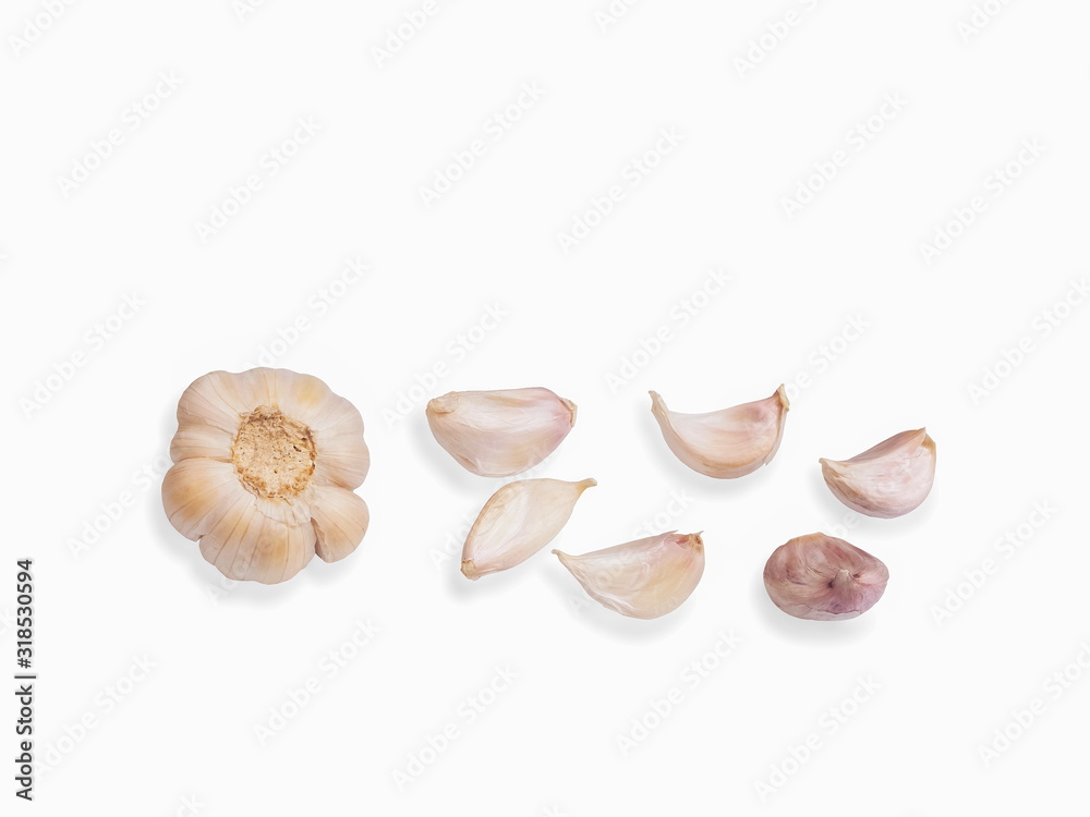 view of fresh Garlic slices isolated on white background.