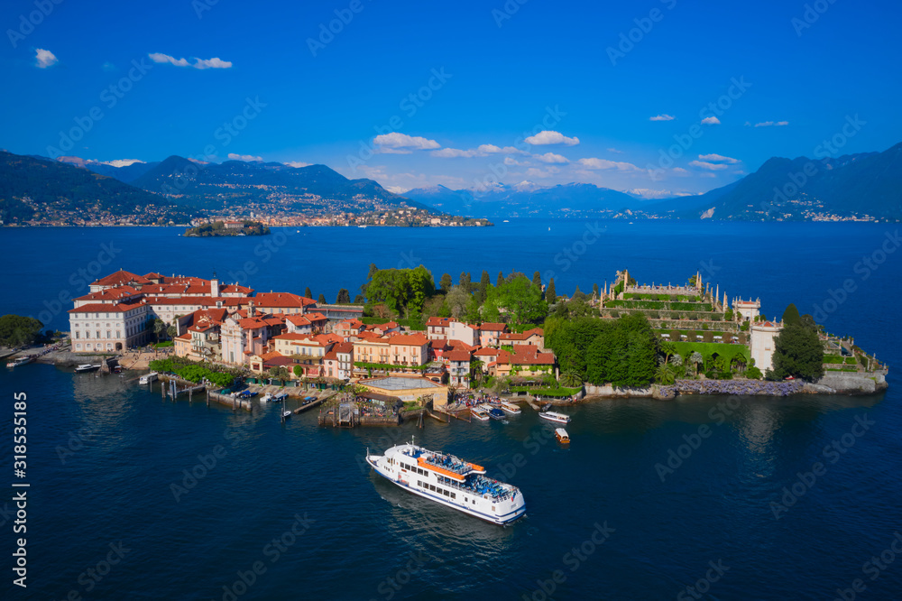 Lake Maggiore, island, Isola Bella, Italy. A ship with tourists to the island. Aerial view of the island, Isola Bella