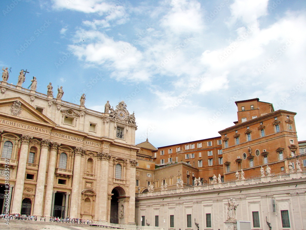 Panorama of architectural and sculptural masterpieces of the Middle Ages on St. Peter's Square on a warm summer day. 