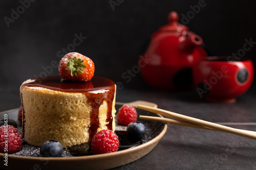Bild auf Leinwand Trendy asian food, Fluffy homemade japanese souffle pancakes, hotcakes with raspberry, blackberry with copy space