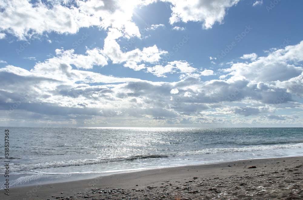 horizon and shiny sea under a beautiful cloudscape horizon and shiny sea under a beautiful cloudscape