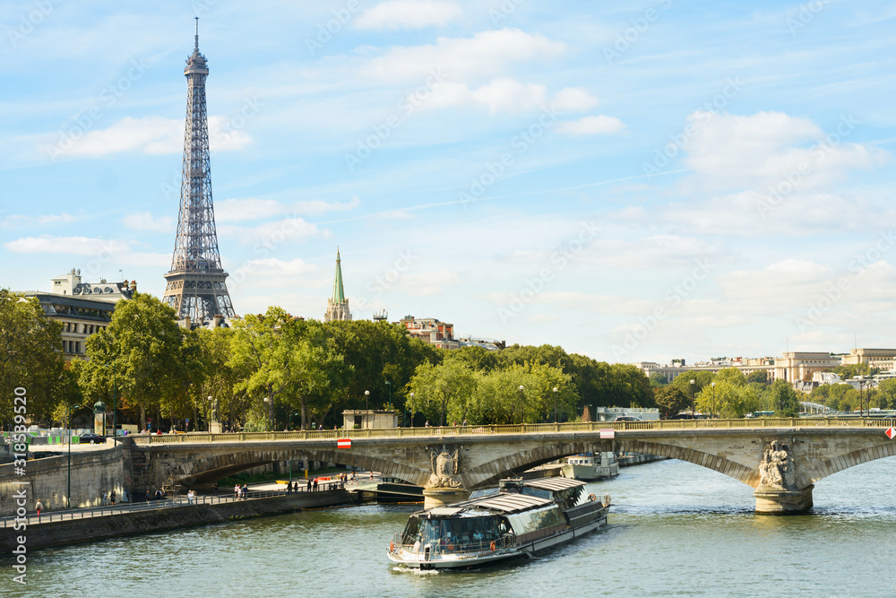 Cityscape with Eiffel tower, cruise boat, buildings, bridge