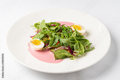 salad with egg and sauce