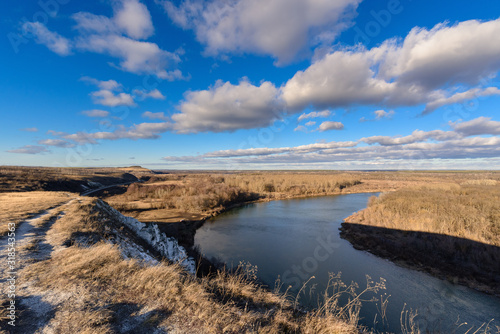panorama of nature in early spring. river in the sun