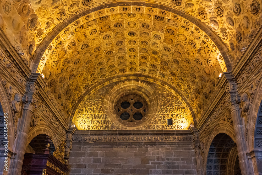 View of the vaults of the Sacristy Major with hundreds of sculptures of different faces of characters from the story, Siguenza Cathedral, Aragon, Spain