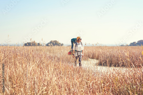 Korean woman is backpacking on an island in Korea.