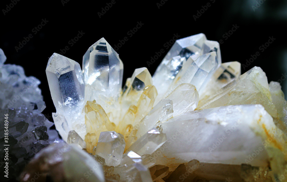 Texture of gemstone rhinestone closeup as a part of cluster geode filled with rock Quartz crystals. Texture of gemstone rhinestone closeup as a part of cluster geode filled with rock Quartz crystals.